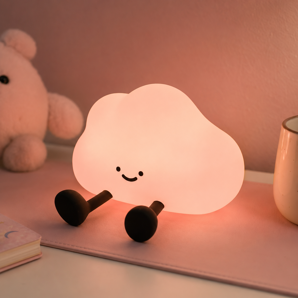 YISUN cloud-shaped silicone night light glowing soft pink on a kawaii desk in the evening