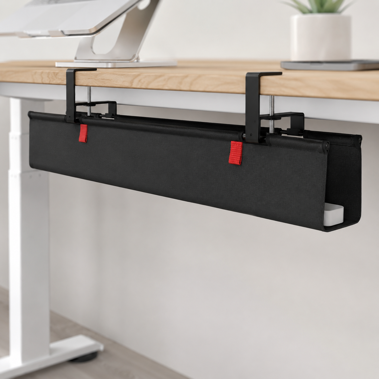 Univivi no-drill under-desk cable management tray concealing cables beneath a desk